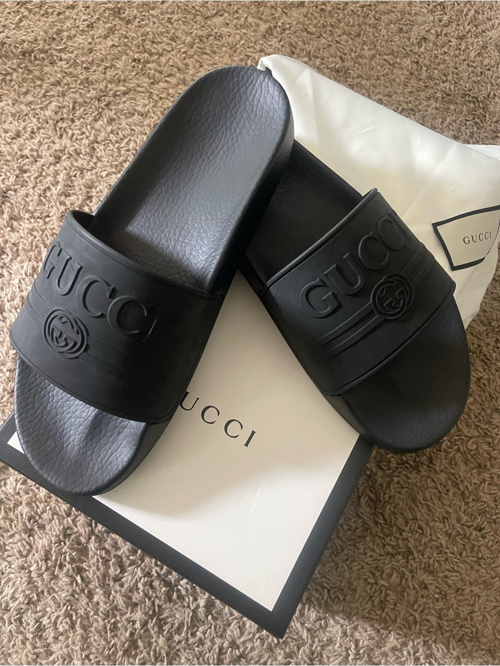 Gucci Black Embossed Logo Rubber Slides for Men